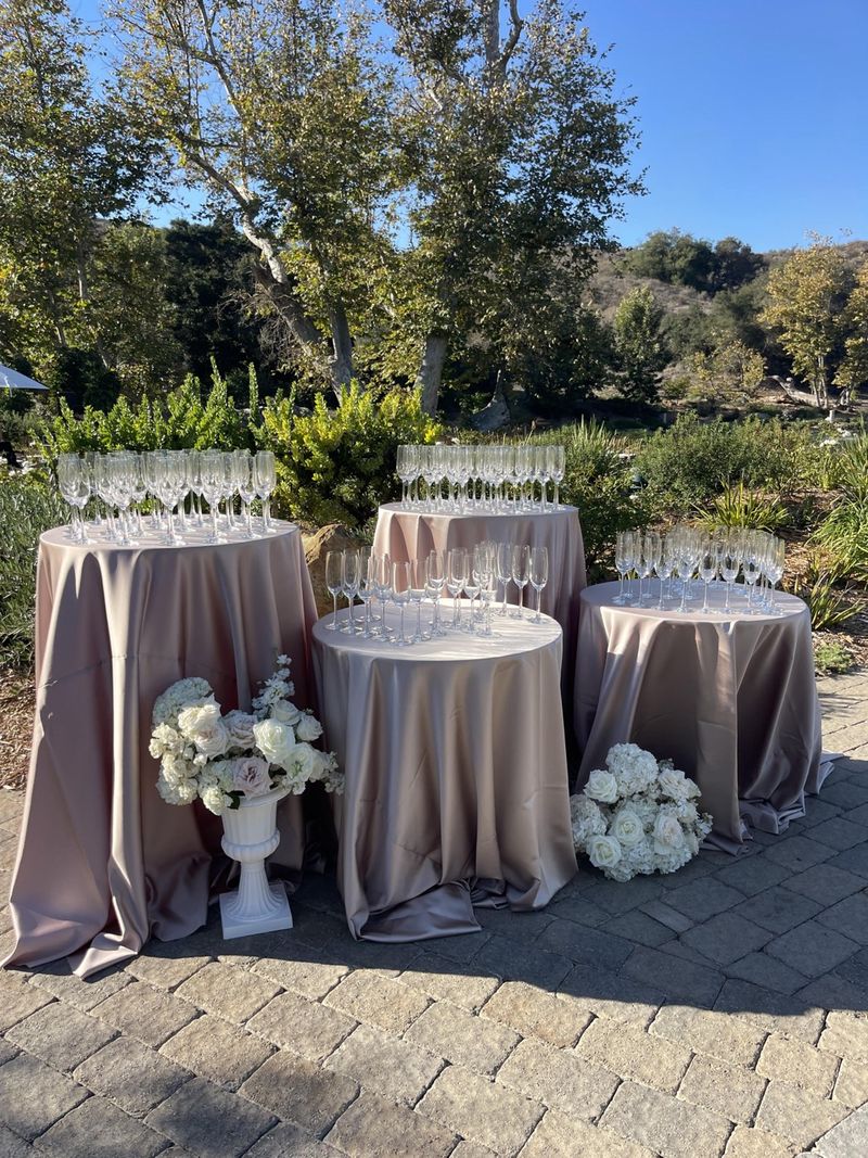 Elegant champagne station with gold accents at a wedding reception